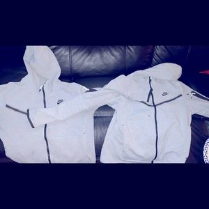 Two Nike tech sweaters